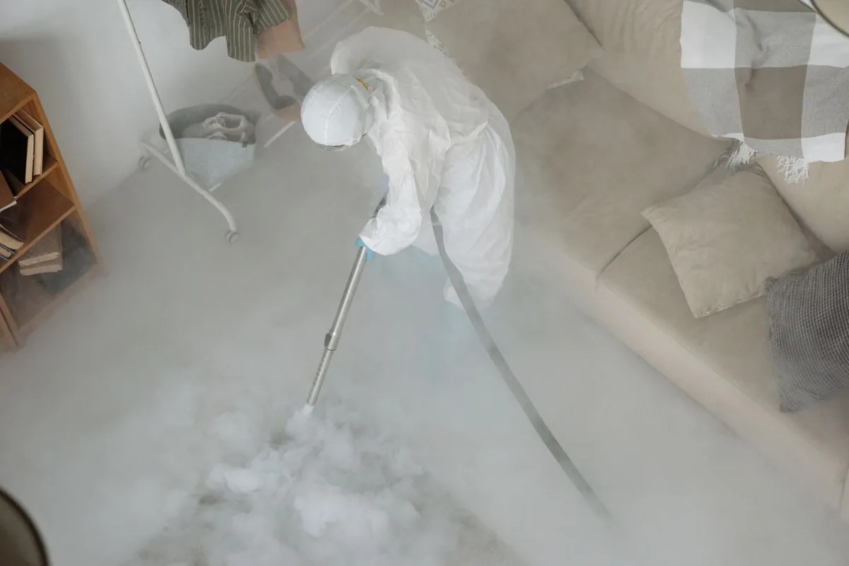 Biohazard cleanup technician in protective equipment, Salunga, PA